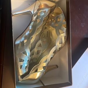 Gold peep toe pumps